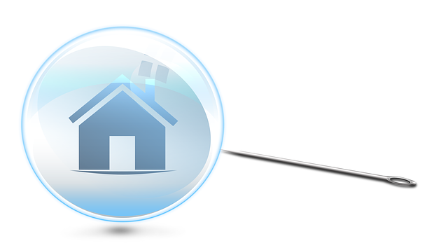 Eine Luftblase mit Haussymbol mit einer Nadel die zuzustehen droht